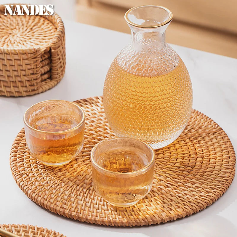 Posavasos e Individuales Marula Coil tejidos de ratán · Set decorativo apilable