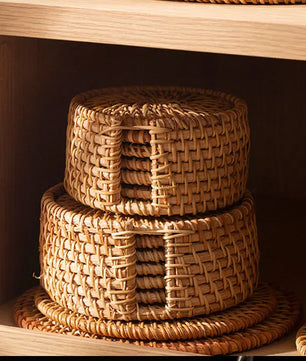 Posavasos e Individuales Marula Coil tejidos de ratán · Set decorativo apilable